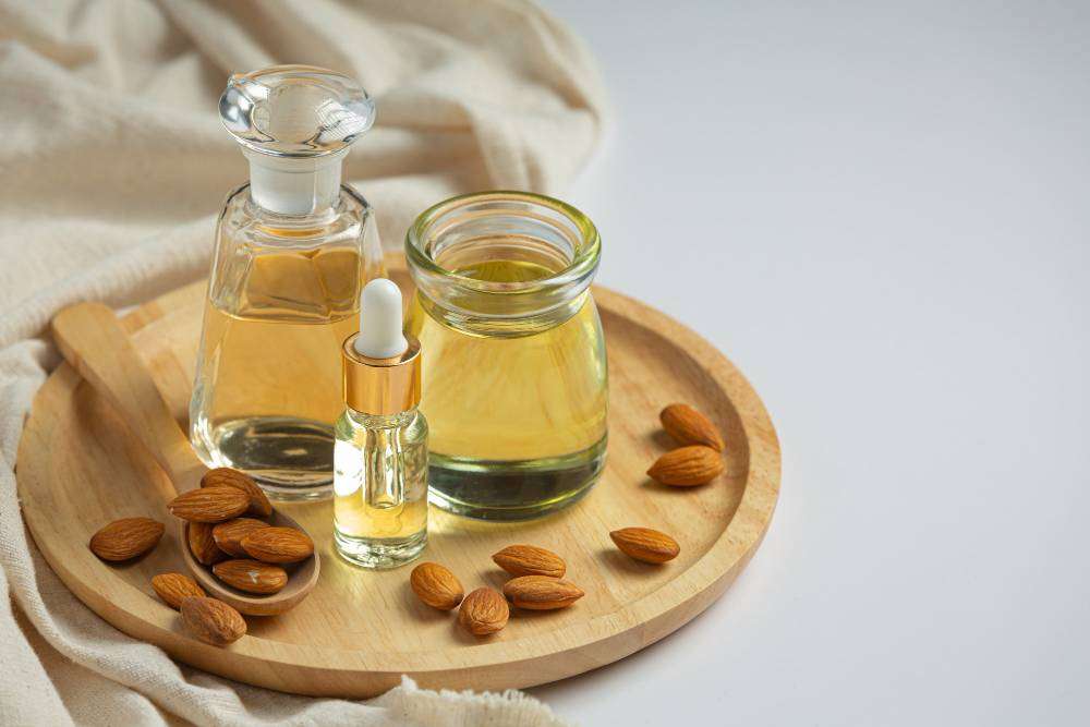 <a href="https://www.freepik.com/free-photo/almond-oil-bottle-white-background_14740081.htm#query=Almond%20Oil&position=8&from_view=search&track=ais">Image by jcomp</a> on Freepik