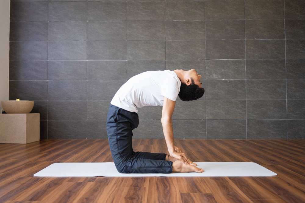 <a href="https://www.freepik.com/free-photo/yogi-doing-camel-yoga-pose-gym_3298047.htm#query=Baddha%20Konasana%20Or%20Cobbler%20Pose&position=22&from_view=search&track=ais">Image by katemangostar</a> on Freepik